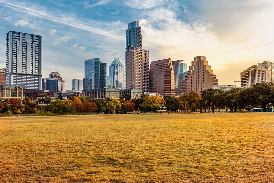 Texas - City Line View of Austin Texas in Fall at Sunrise