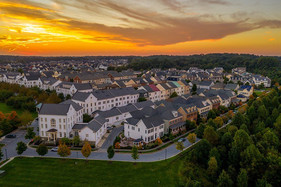 Texas - Newly Developed Neighborhood with Single Family Homes and Townhouses in Texas at Sunset in the Fall